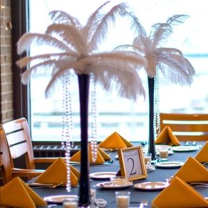 21” inch high black glass vases.  Two dozen.